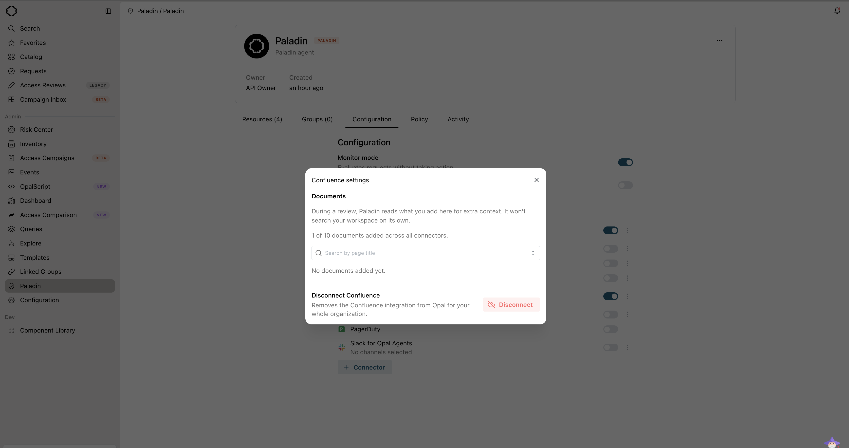 The Confluence settings dialog, adding specific pages for Paladin to read as context during a review.