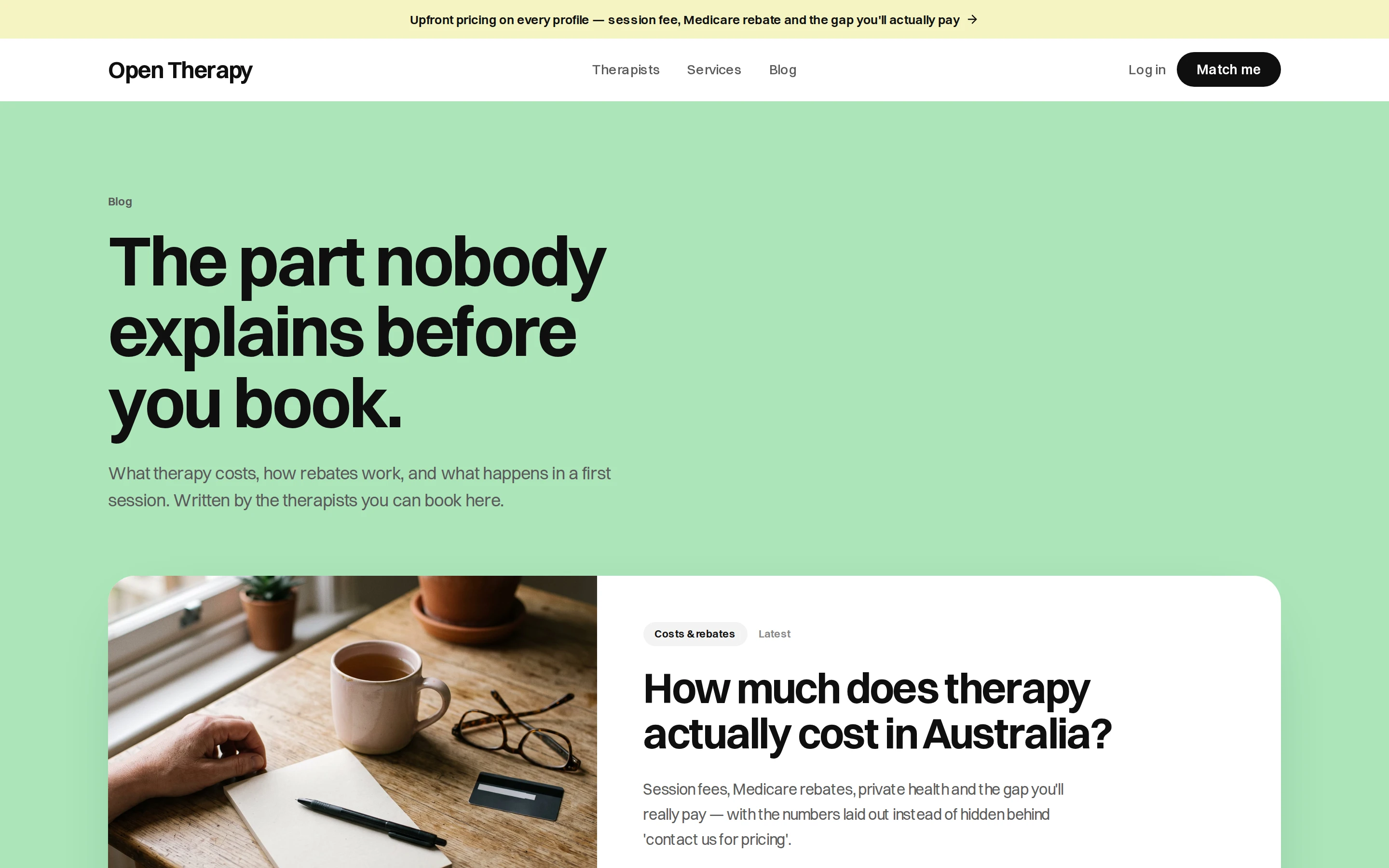 The public Open Therapy blog headed The part nobody explains before you book, with a line saying it is written by the therapists you can book in the directory, and a lead article on what therapy actually costs in Australia filed under Costs and rebates with a byline, date and four-minute read time