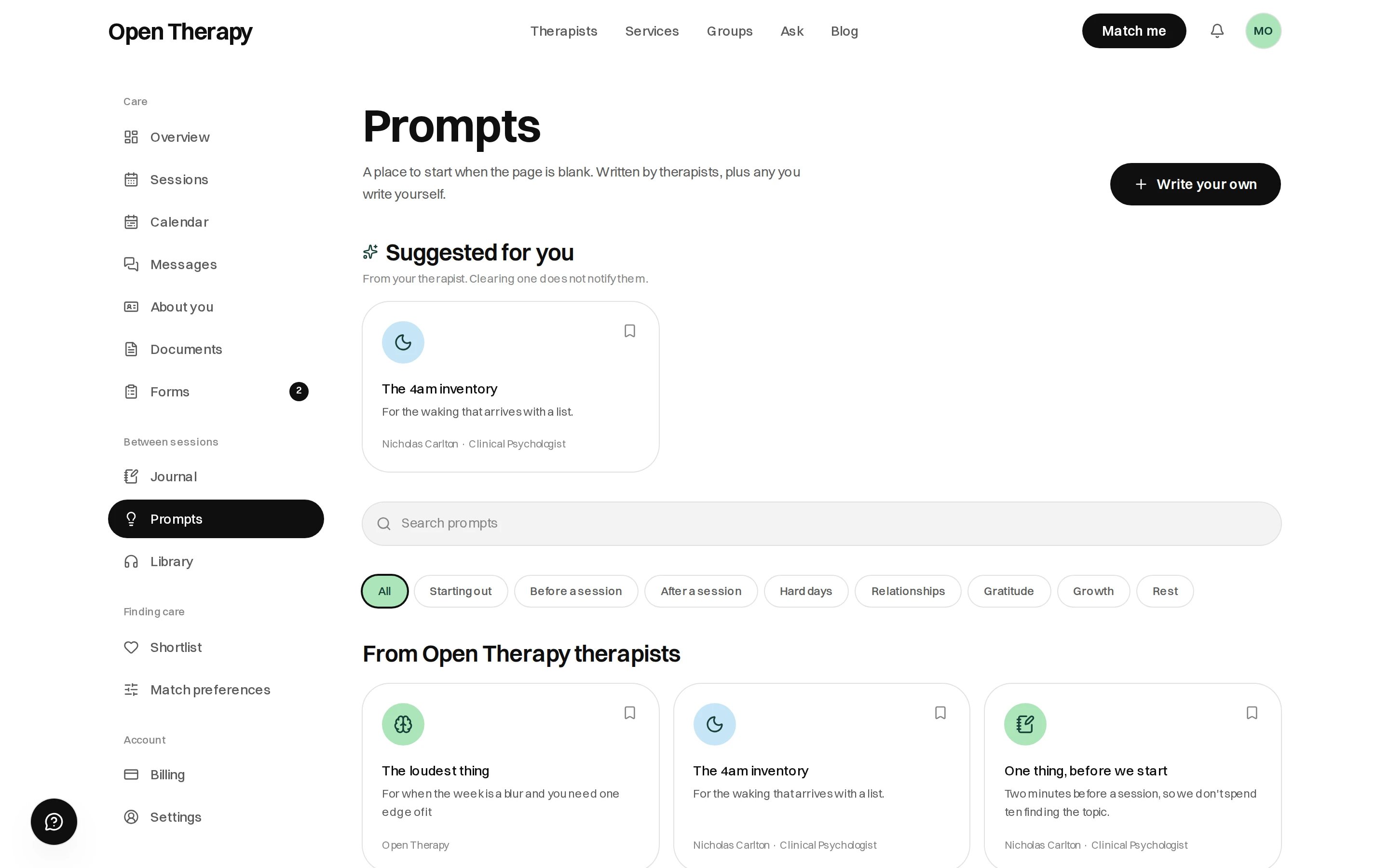 The Prompts page in the workspace with a Write your own button, a Suggested for you card from a clinical psychologist, a search field, category filter pills, and a row of prompt cards under the heading From Open Therapy therapists, each with a bookmark in the corner.