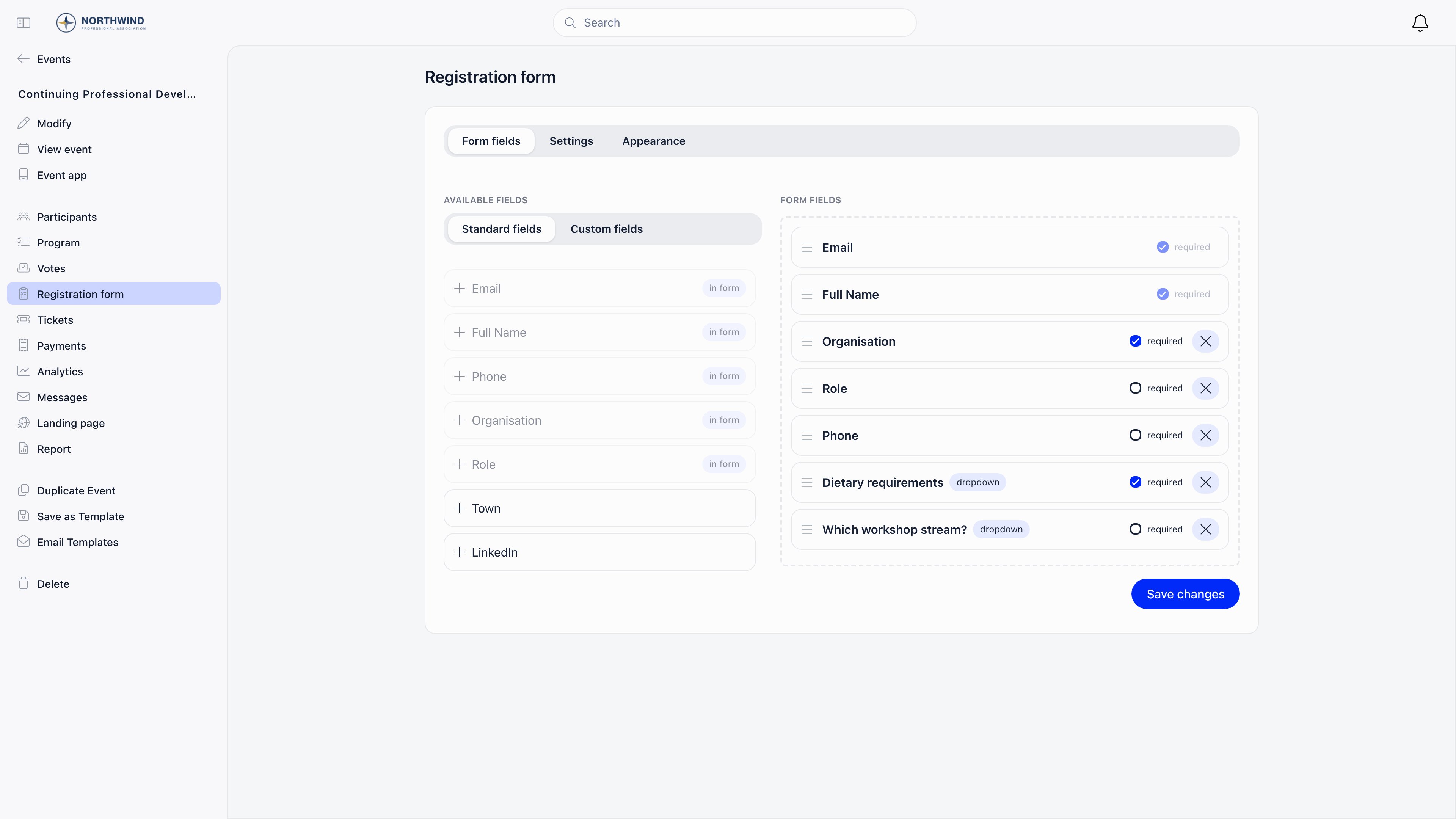Event registration form builder with the Standard fields and Custom fields tabs on the left over a list of available fields, and the chosen form fields on the right with Email and Full Name both marked required