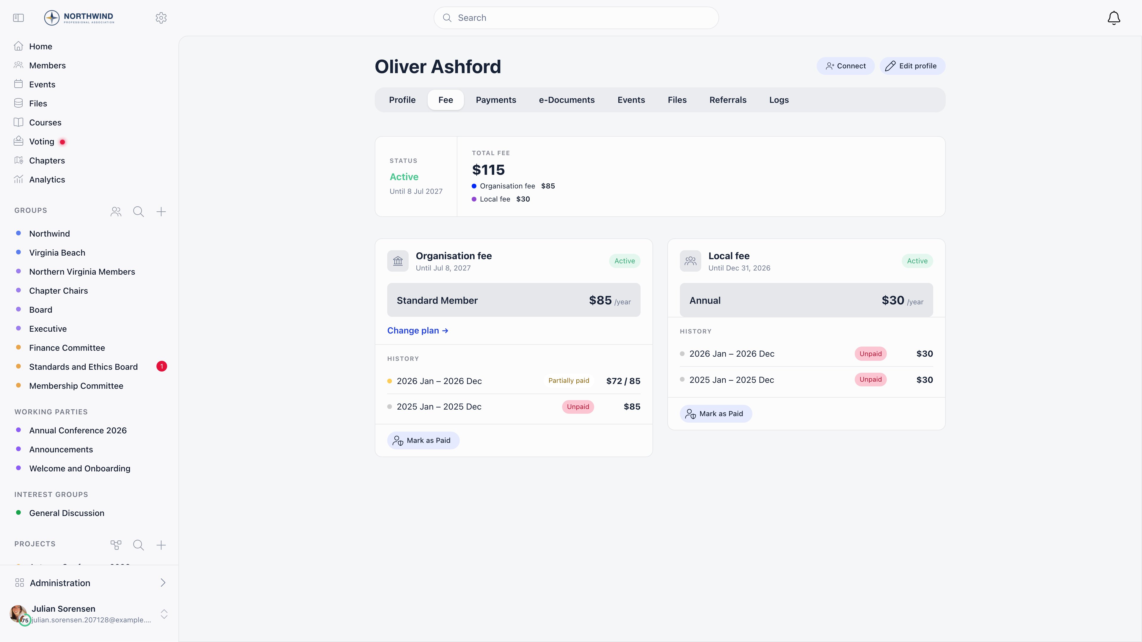 Member profile Fee tab with a summary card splitting the total fee into an organisation line and a chapter line, above an Organisation fee card and a Local fee card side by side, each showing its tier, validity and payment history