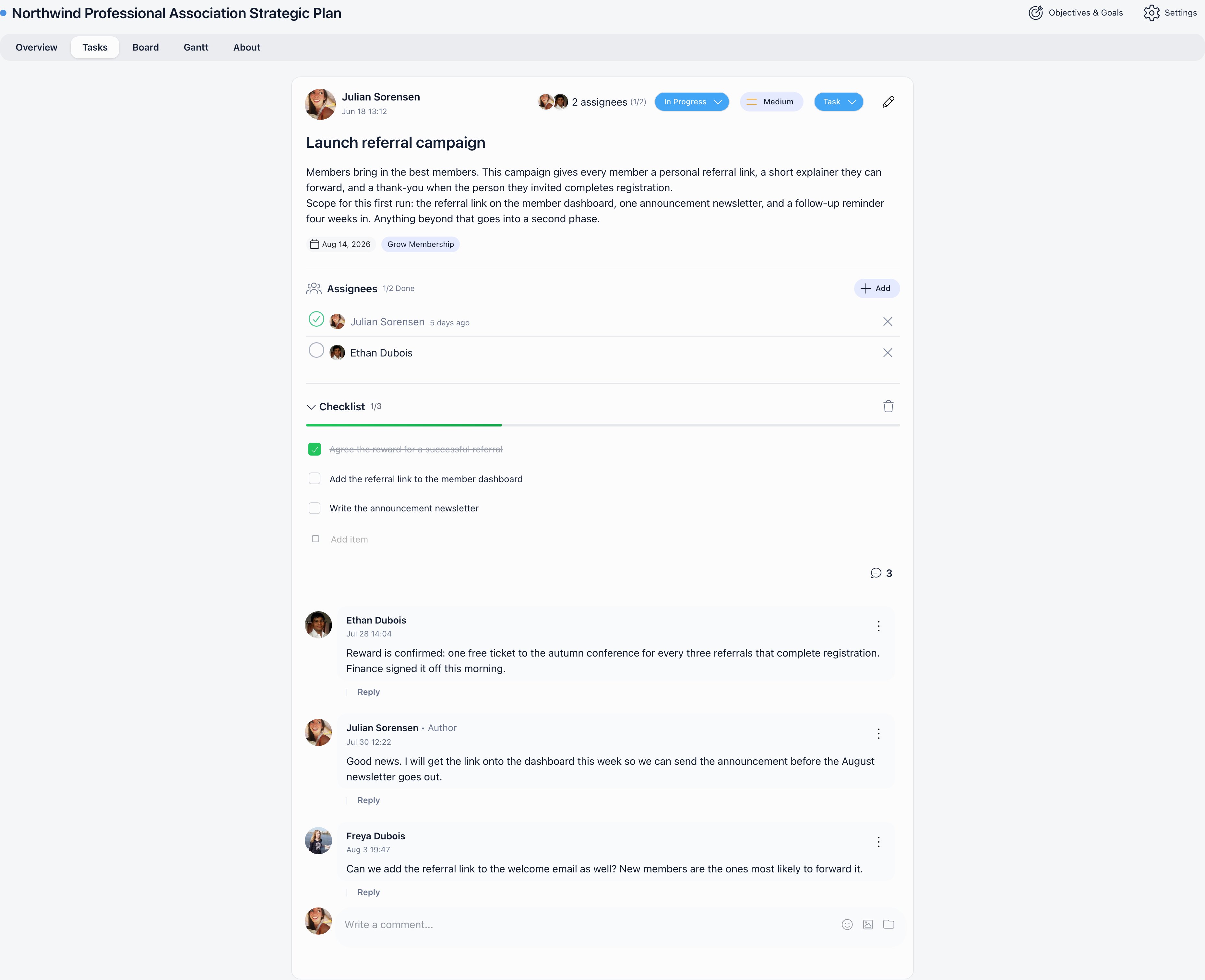Task detail page showing status, priority and type controls, two assignees with completion ticks, a three item checklist and a comment thread