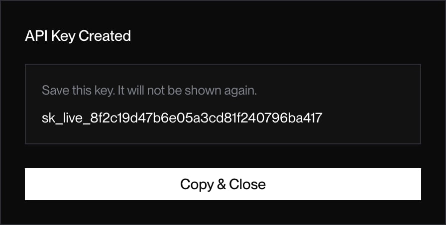 API Key Created dialog showing the full sk_live key above a Copy and Close button