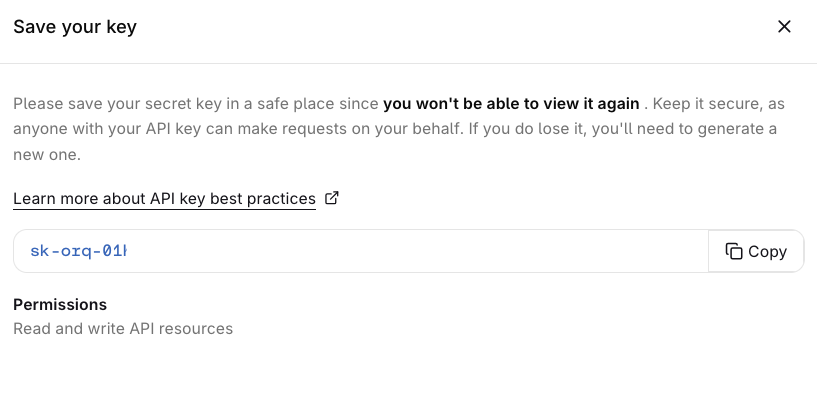 Save your key dialog showing the API key token with a Copy button and a Permissions summary reading Read and write API resources.
