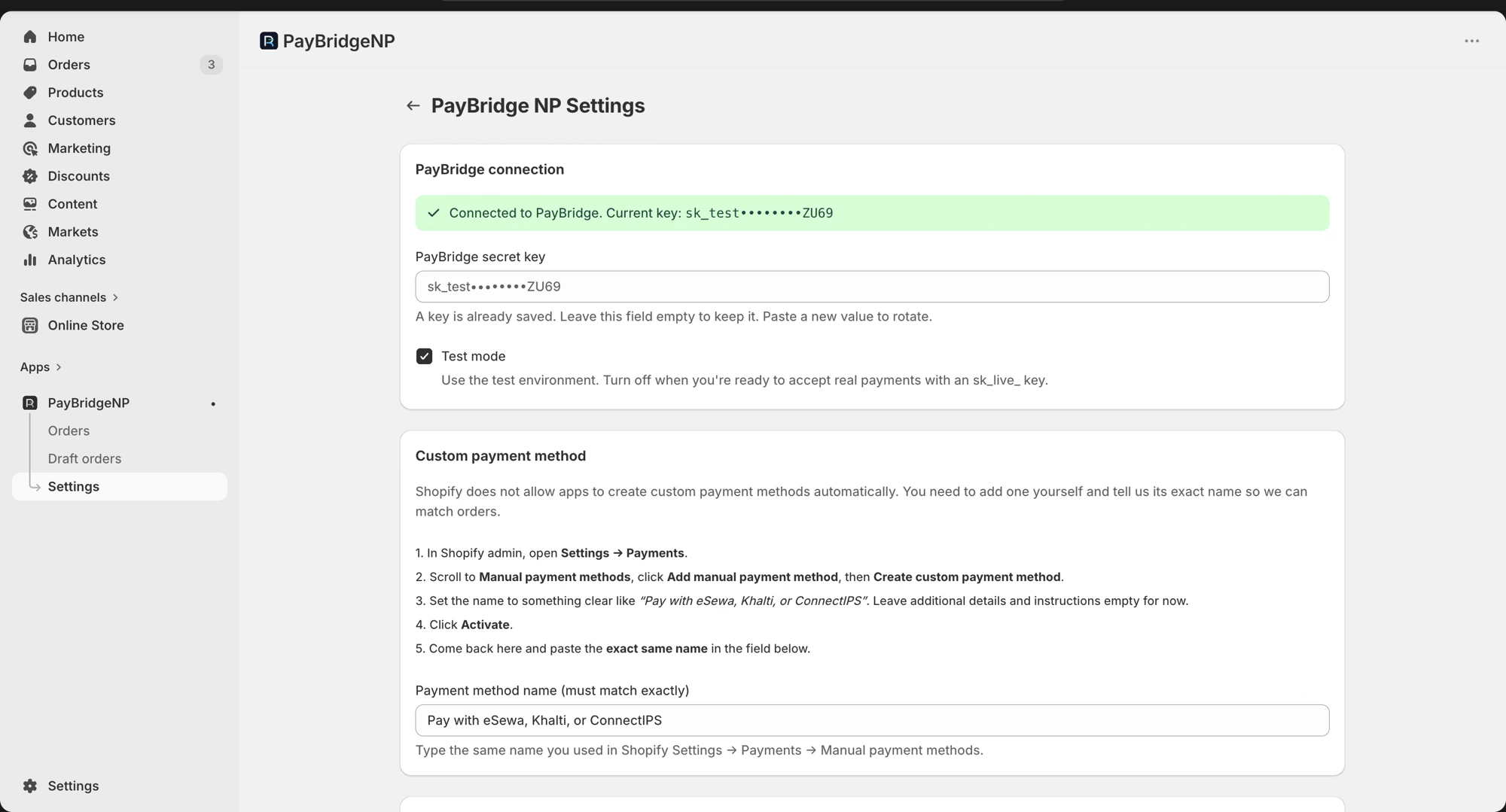 The Settings page showing a successful PayBridgeNP connection with a masked API key, a Test mode toggle, and instructions for creating a custom payment method in Shopify admin