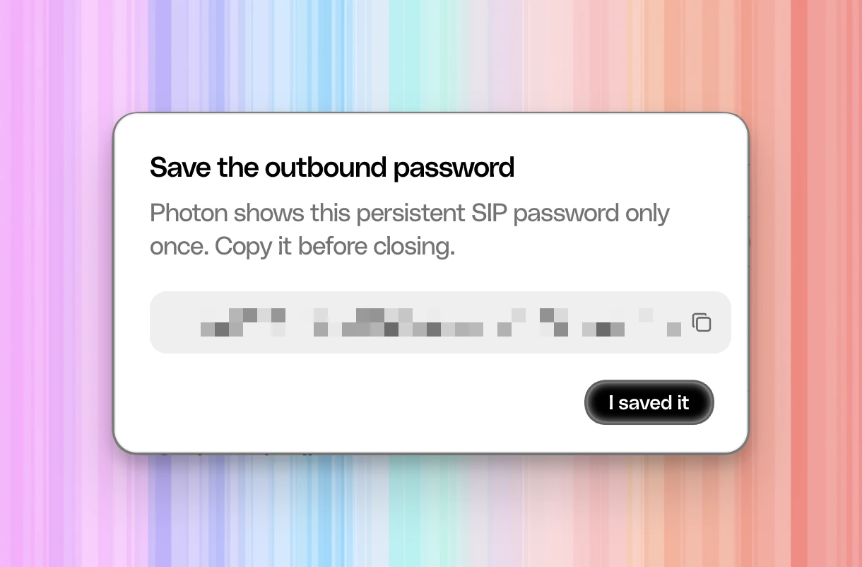 Photon one-time outbound password dialog with the password concealed and the I saved it button.