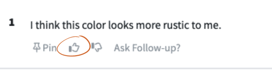 Thumbs-up button below a respondent's written comment