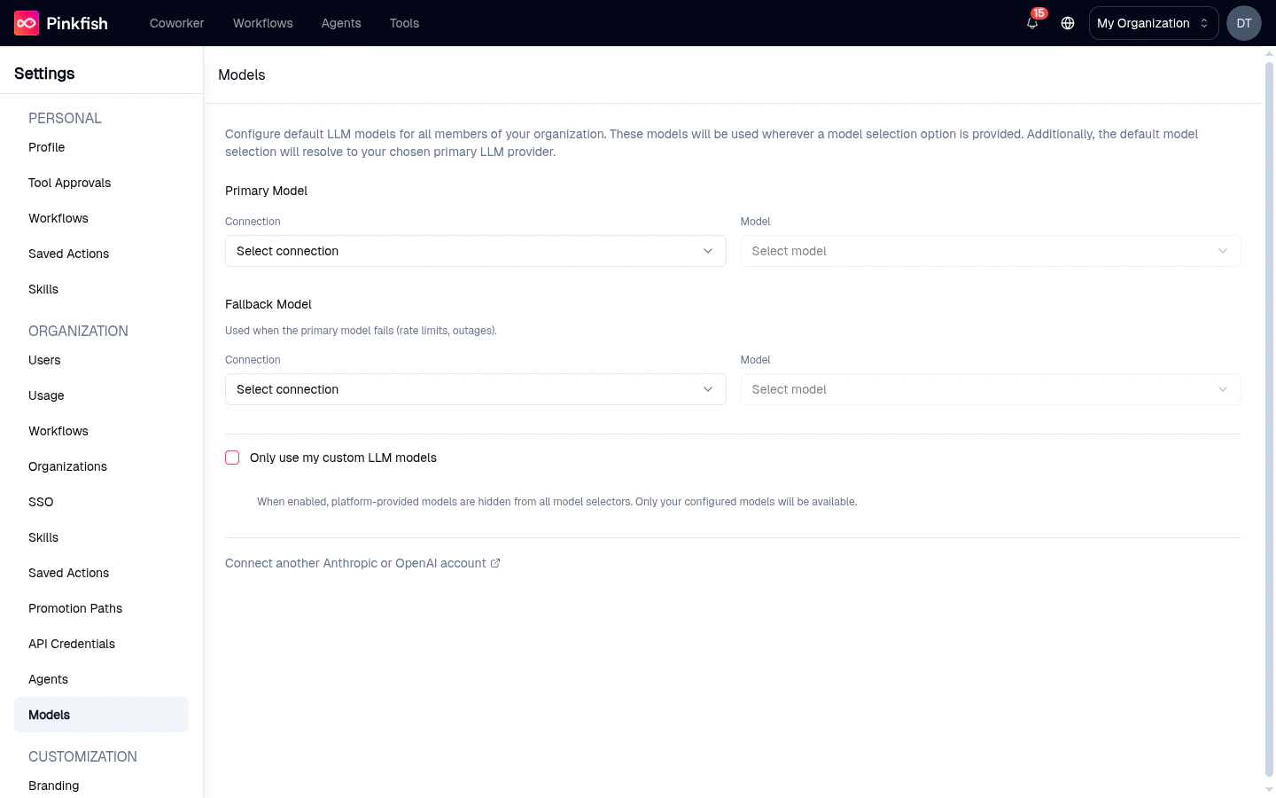 Settings → Organization → Models page showing Primary Model and Fallback Model connection/model selectors and the 'Only use my custom LLM models' toggle.