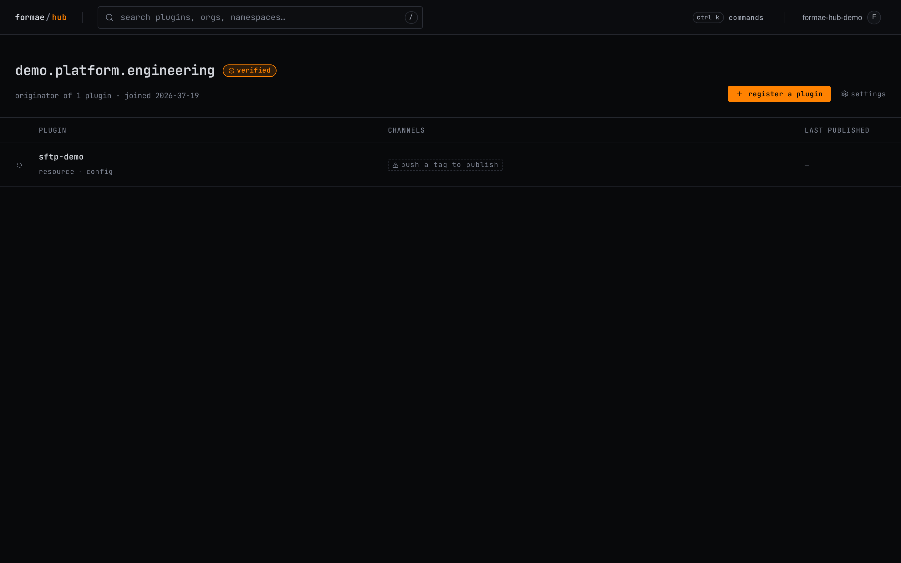 The organization page listing the registered plugin with a prompt to push a tag
