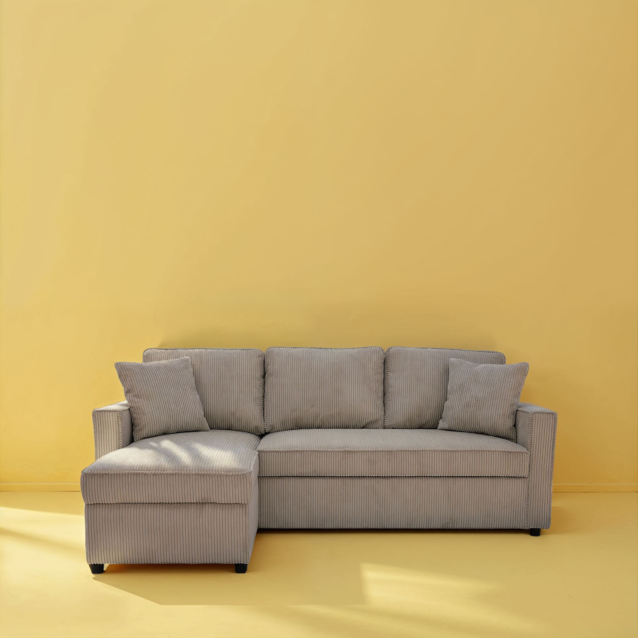 Sofa against a wall in a cheerful living room