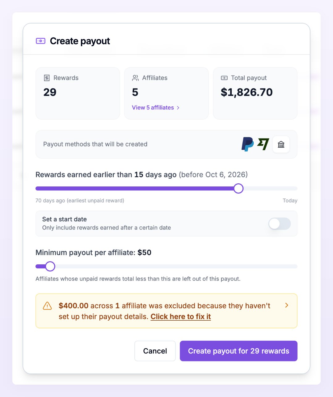 The Create payout dialog with the amber message that an affiliate was excluded because they have not set up their payout details, and the Click here to fix it link