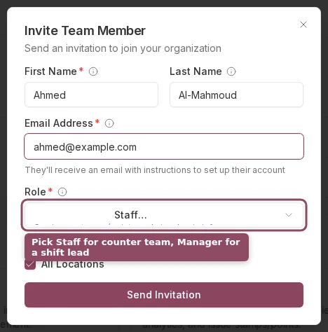 Invite Team Member form with the Role field set to Staff