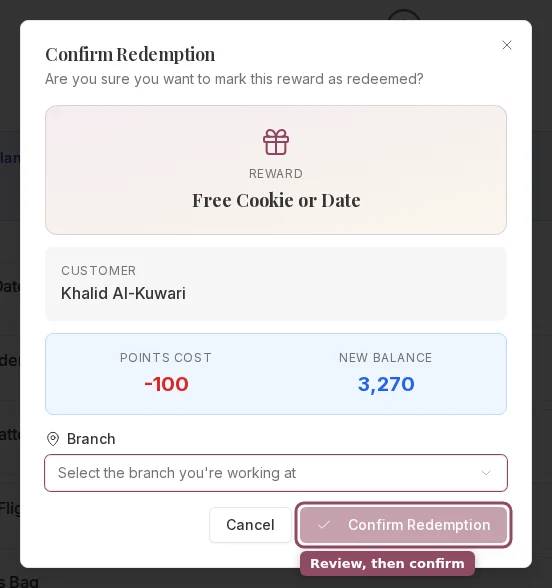 The Confirm Redemption dialog showing the reward, customer, points cost, and new balance