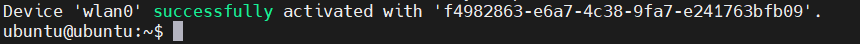 Terminal output reporting that device wlan0 was successfully activated with a connection identifier.
