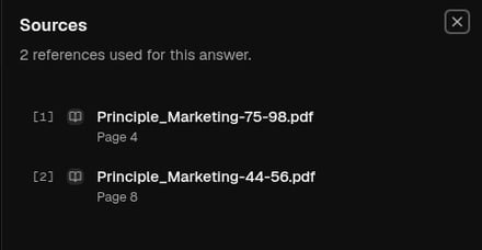 The Sources panel showing two cited PDF passages with page numbers