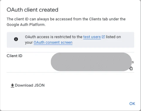 The OAuth client created dialog: the client ID, a Download JSON link, and an OK button.