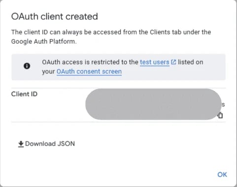 The OAuth client created dialog: the client ID, a Download JSON link, and an OK button.