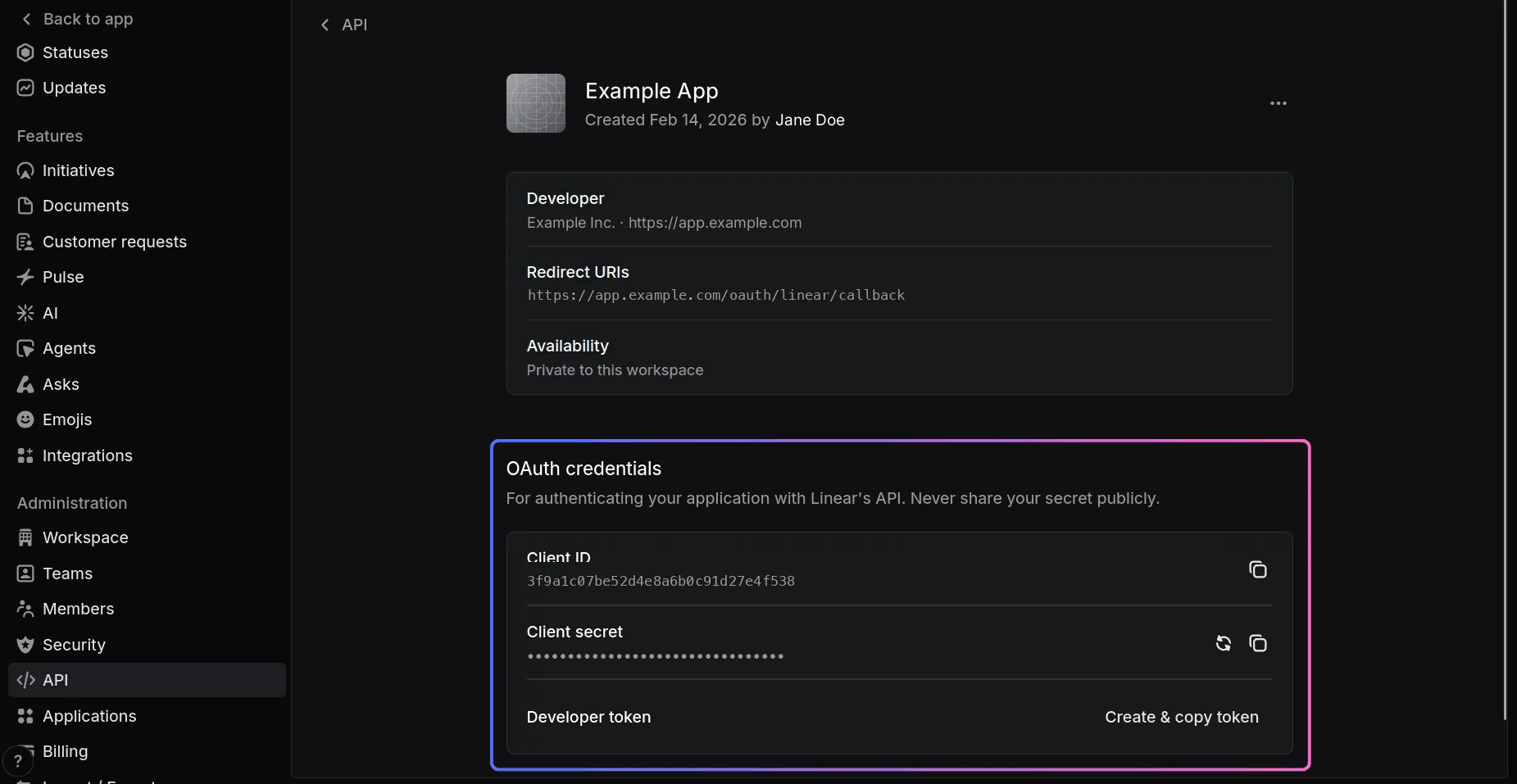 The application's page: developer, redirect URIs and availability, then an OAuth credentials panel with the client ID, a masked client secret, and a developer token row.
