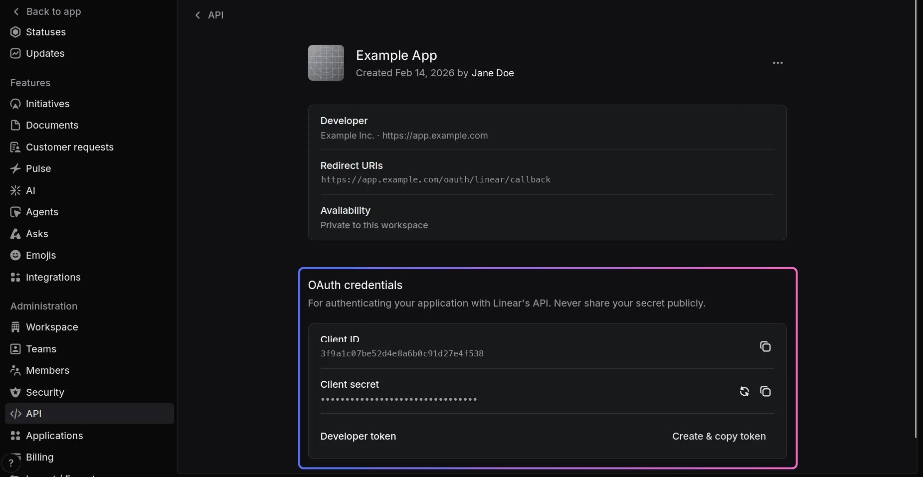 The application's page: developer, redirect URIs and availability, then an OAuth credentials panel with the client ID, a masked client secret, and a developer token row.