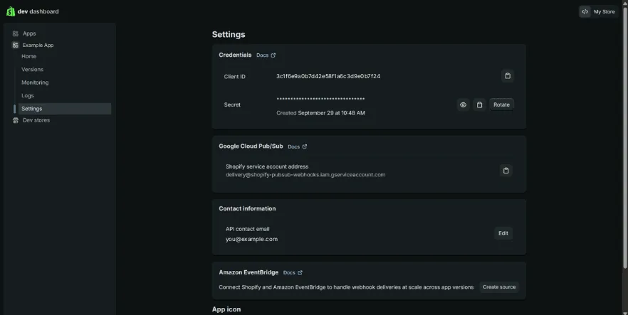 The app's Settings page: a Credentials panel with the client ID and a masked secret with reveal, copy and Rotate buttons.