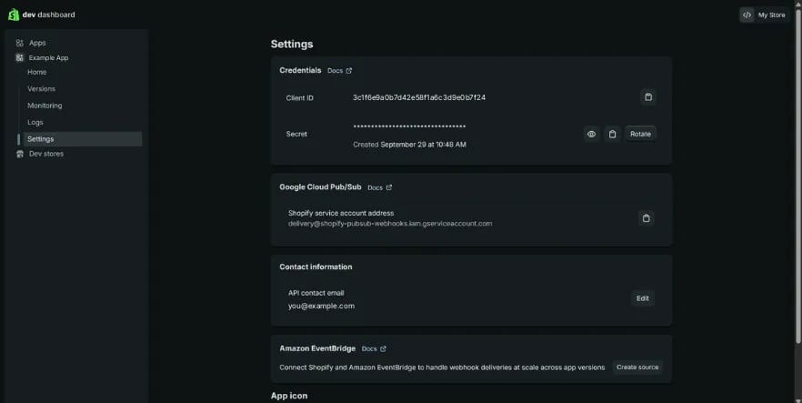 The app's Settings page: a Credentials panel with the client ID and a masked secret with reveal, copy and Rotate buttons.