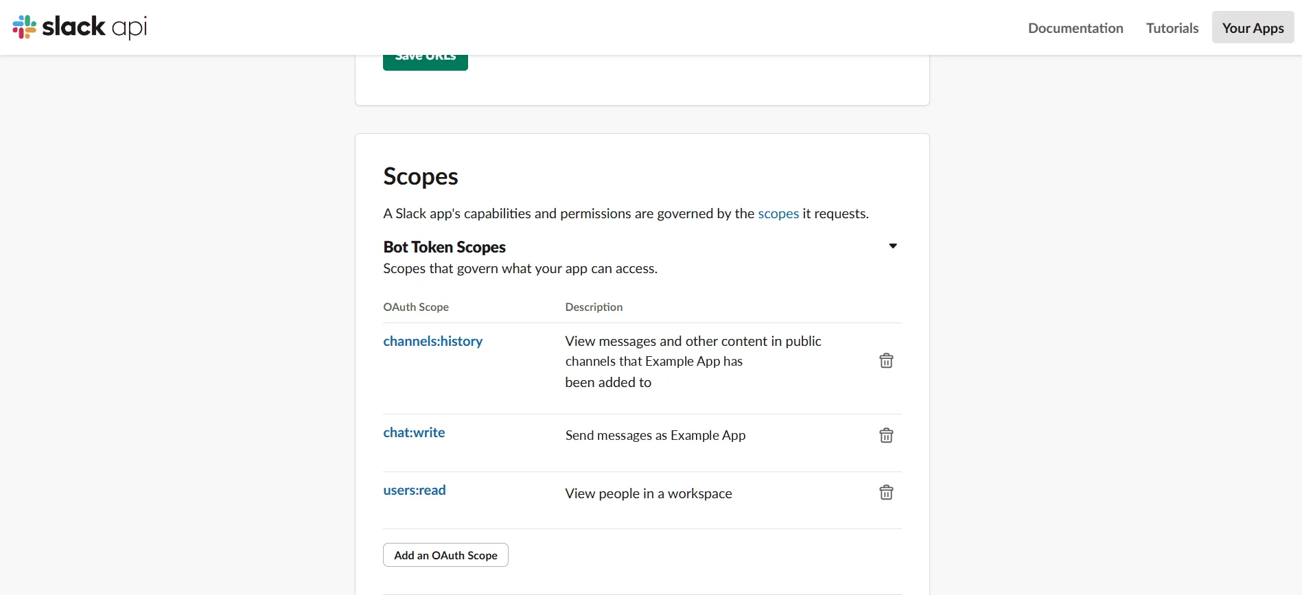 Bot Token Scopes listing channels:history, chat:write and users:read, each with its description, and an Add an OAuth Scope button.