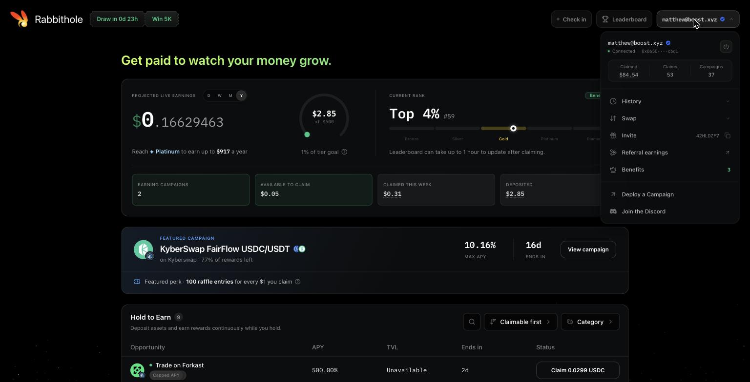 The Rabbithole profile menu showing lifetime claimed total, claim count, campaign count, and links for History, Swap, Invite, Referral earnings, Benefits, Deploy a Campaign, and Join the Discord.