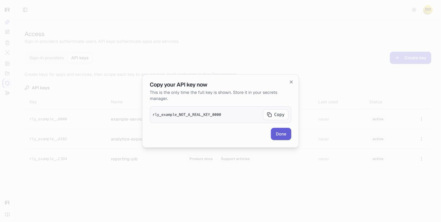 The one-time API key dialog with the full example secret and Copy button
