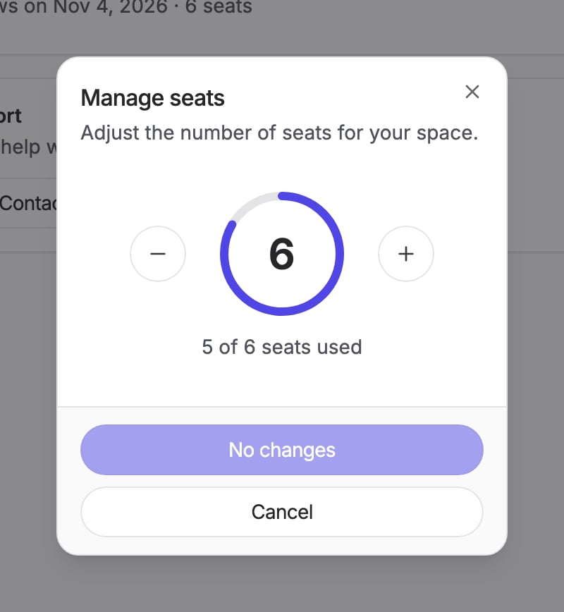 The Manage seats dialog with a seat selector and the number of seats in use