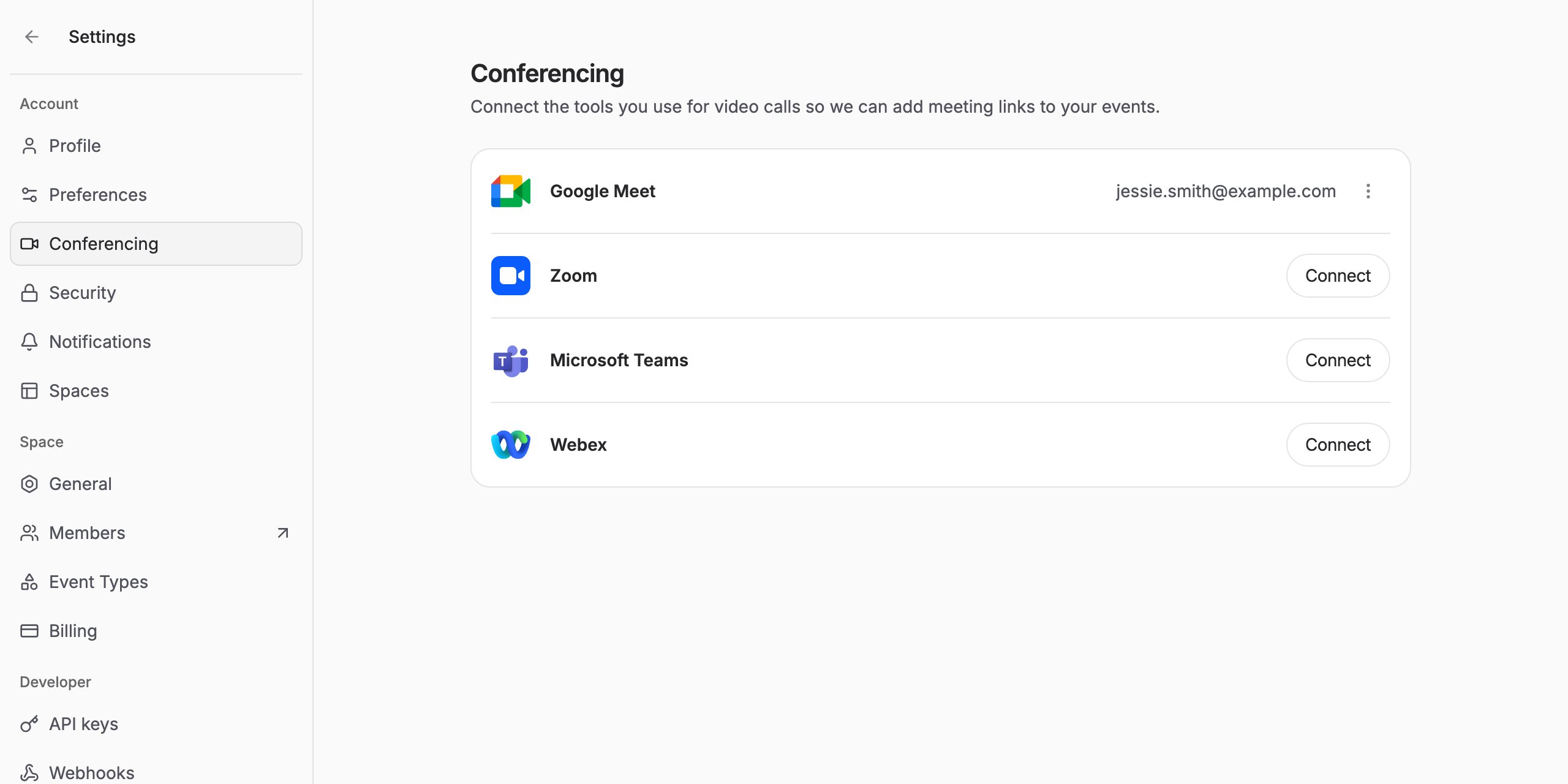 The Conferencing settings page showing the connected account's email address next to Google Meet