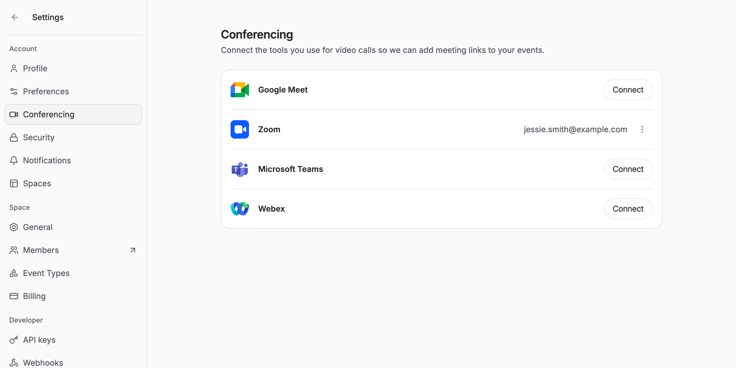 The Conferencing settings page showing the connected account's email address next to Zoom
