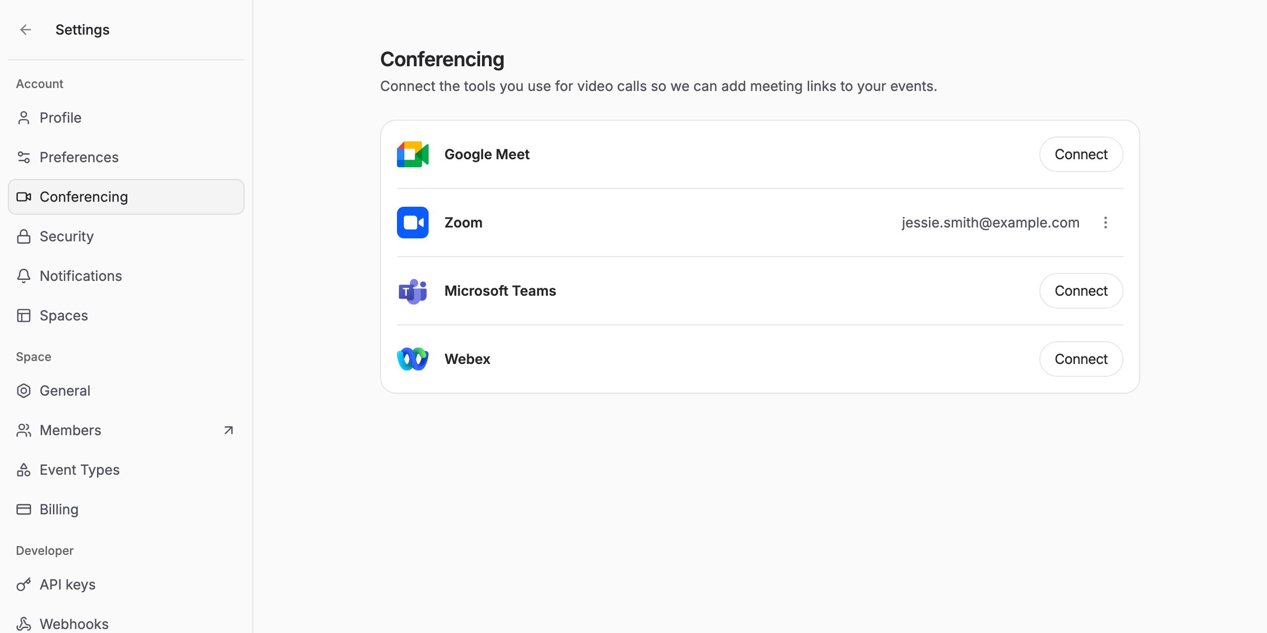 The Conferencing settings page showing the connected account's email address next to Zoom