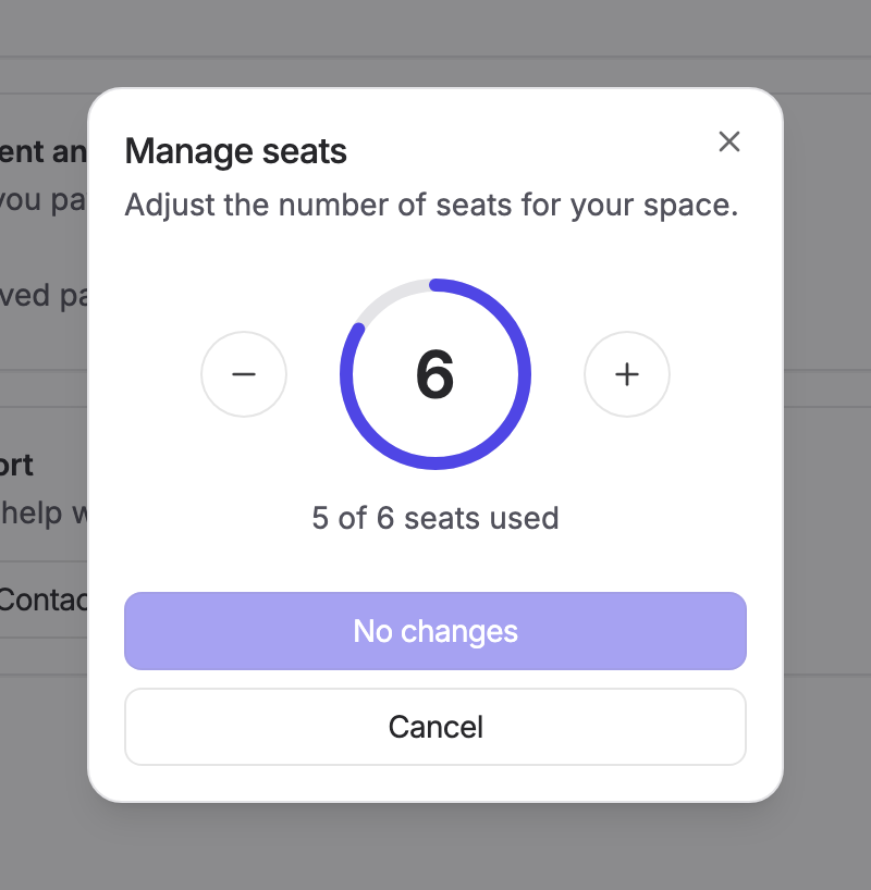 The Manage seats dialog with a seat selector and the number of seats in use
