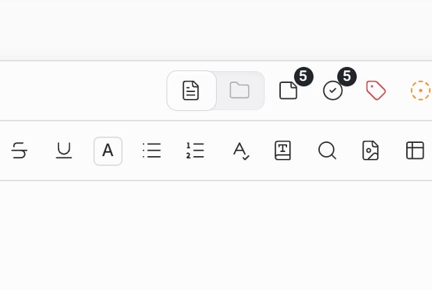 A crop of just the right side of the header on the default screen with a document open. Of the two tabs the left file icon is active, and the two icons are large enough to tell apart. About one line of the manuscript's first line comes in below.