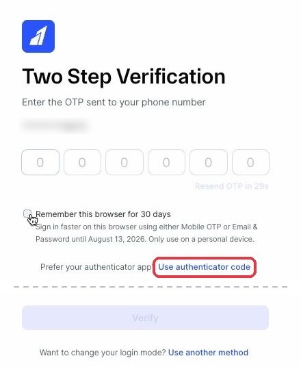 SMS OTP screen with the Use authenticator code link highlighted