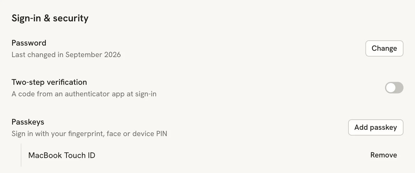 The Sign-in and security section with a passkey named MacBook Touch ID listed under Passkeys, with a Remove button