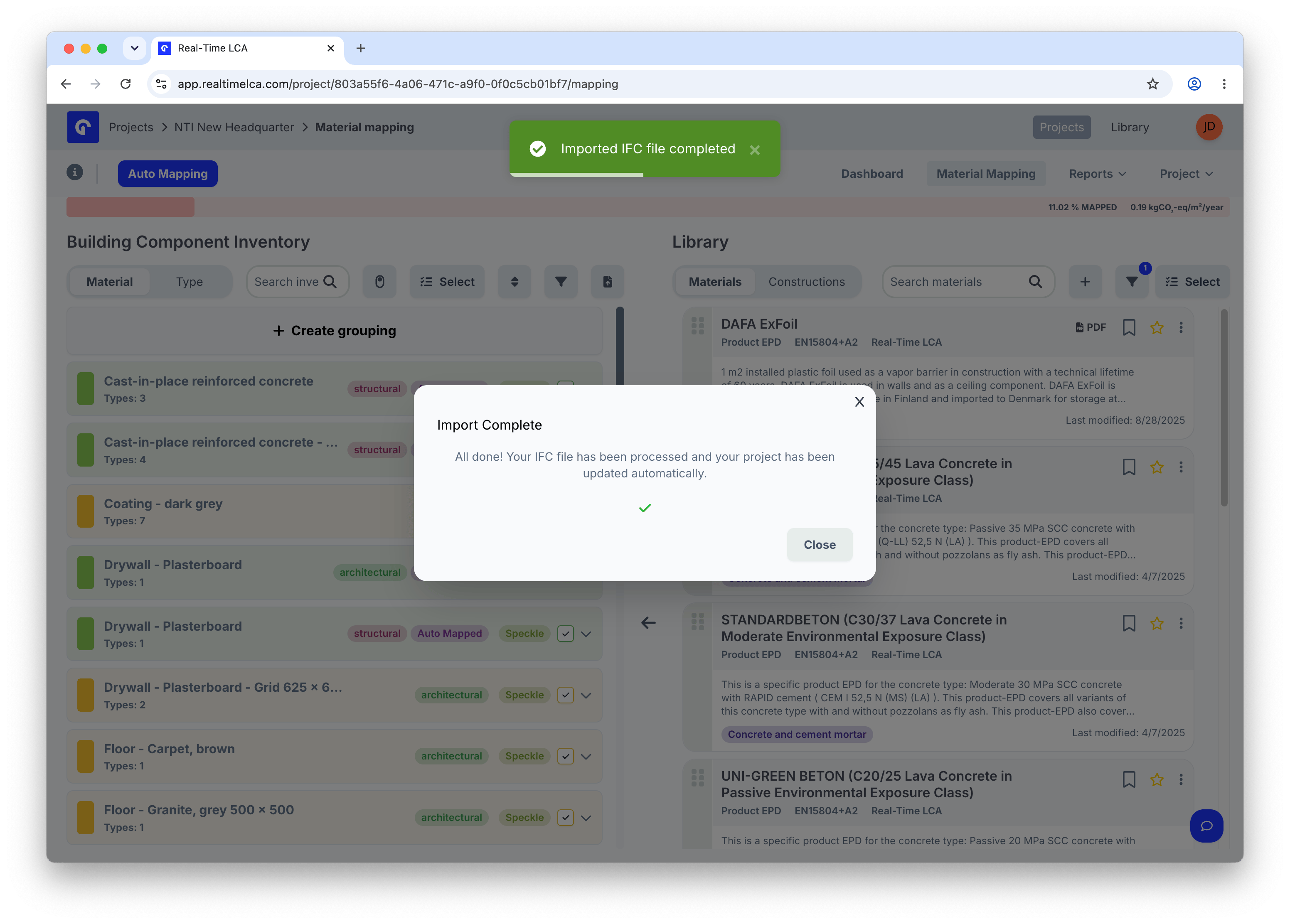 Import Complete dialog confirming the IFC file has been processed and the project has been updated automatically.