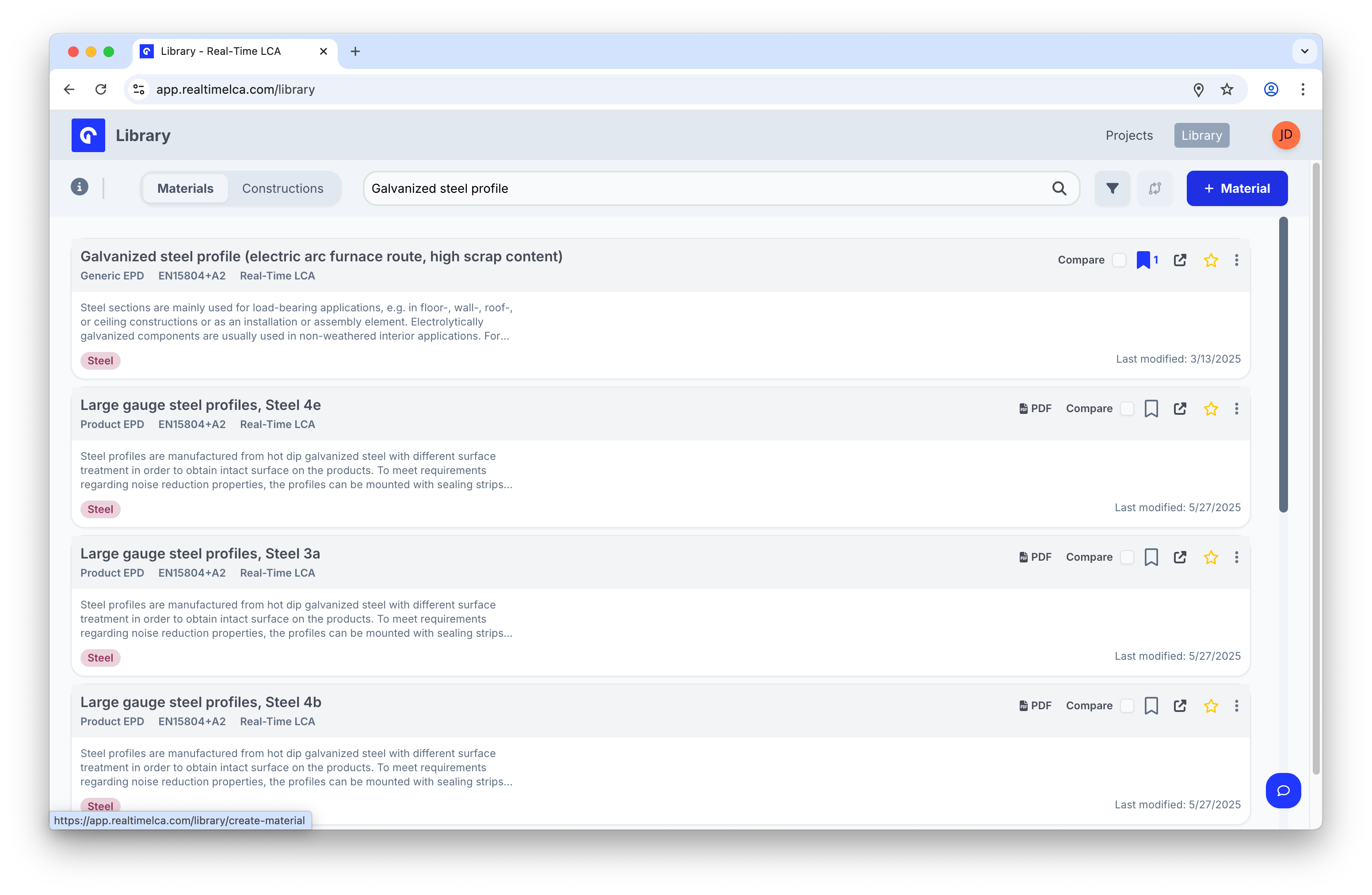 Library toolbar with the + Material button hovered, revealing the create-material URL in the status bar.