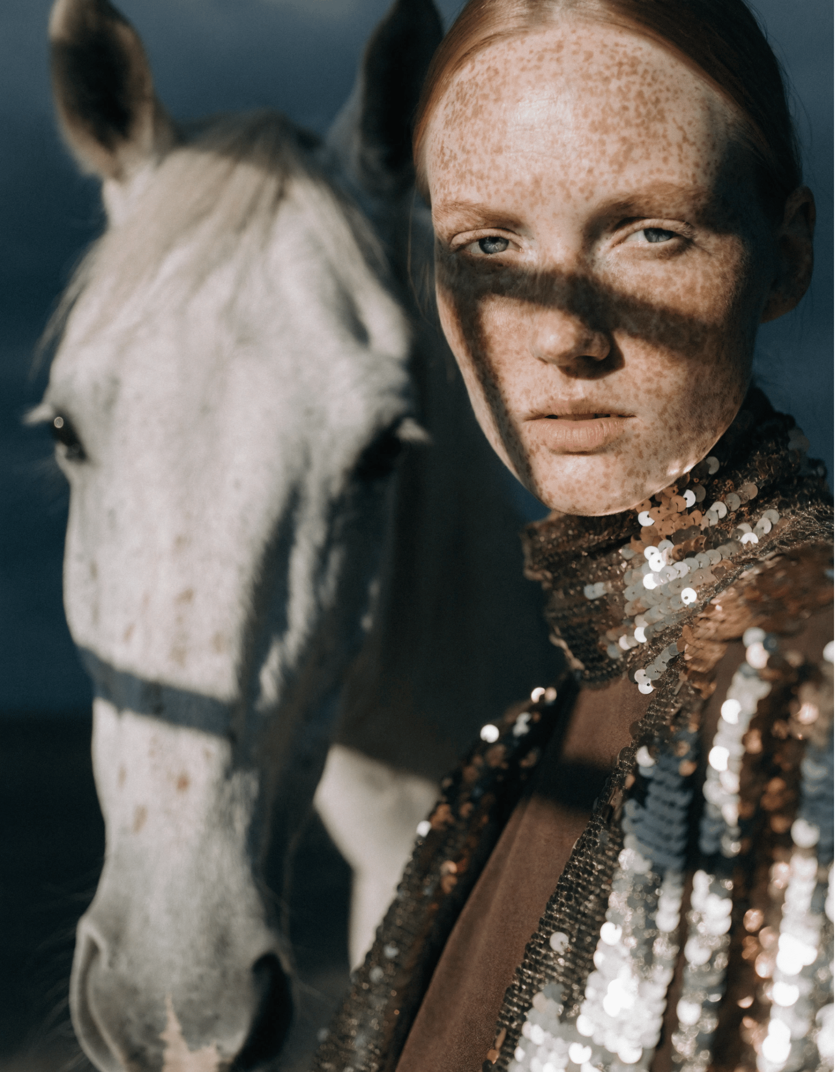 Artistic close-up portrait of a young Caucasian woman.