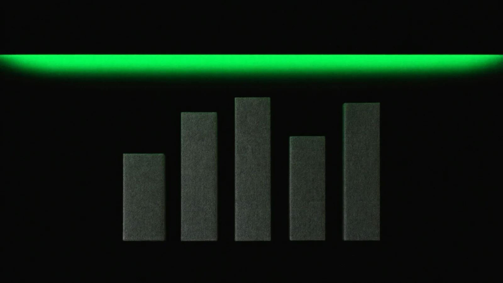 A horizontal green bar of light above five matt blocks of unequal height
