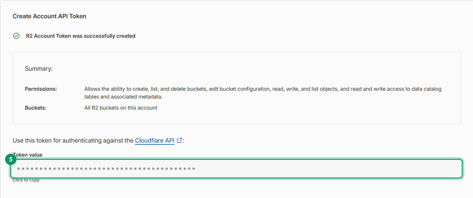 The created token page in Cloudflare, with the token value shown once