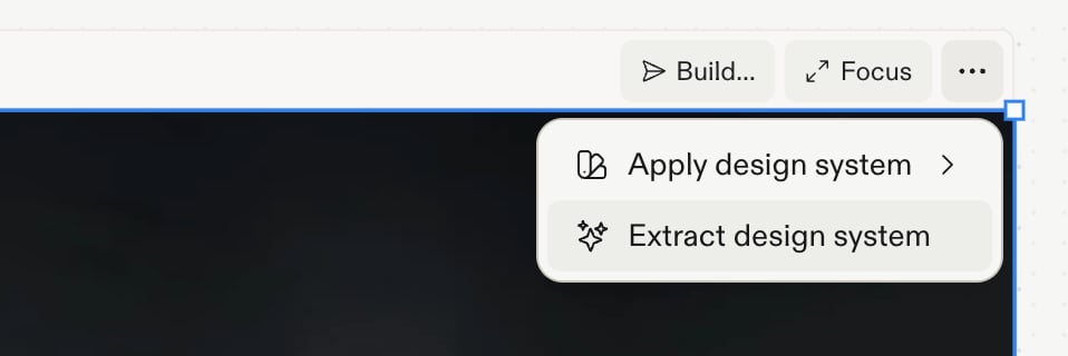 Close-up of a selected frame's action bar with the more-options menu open, showing Apply design system and Extract design system