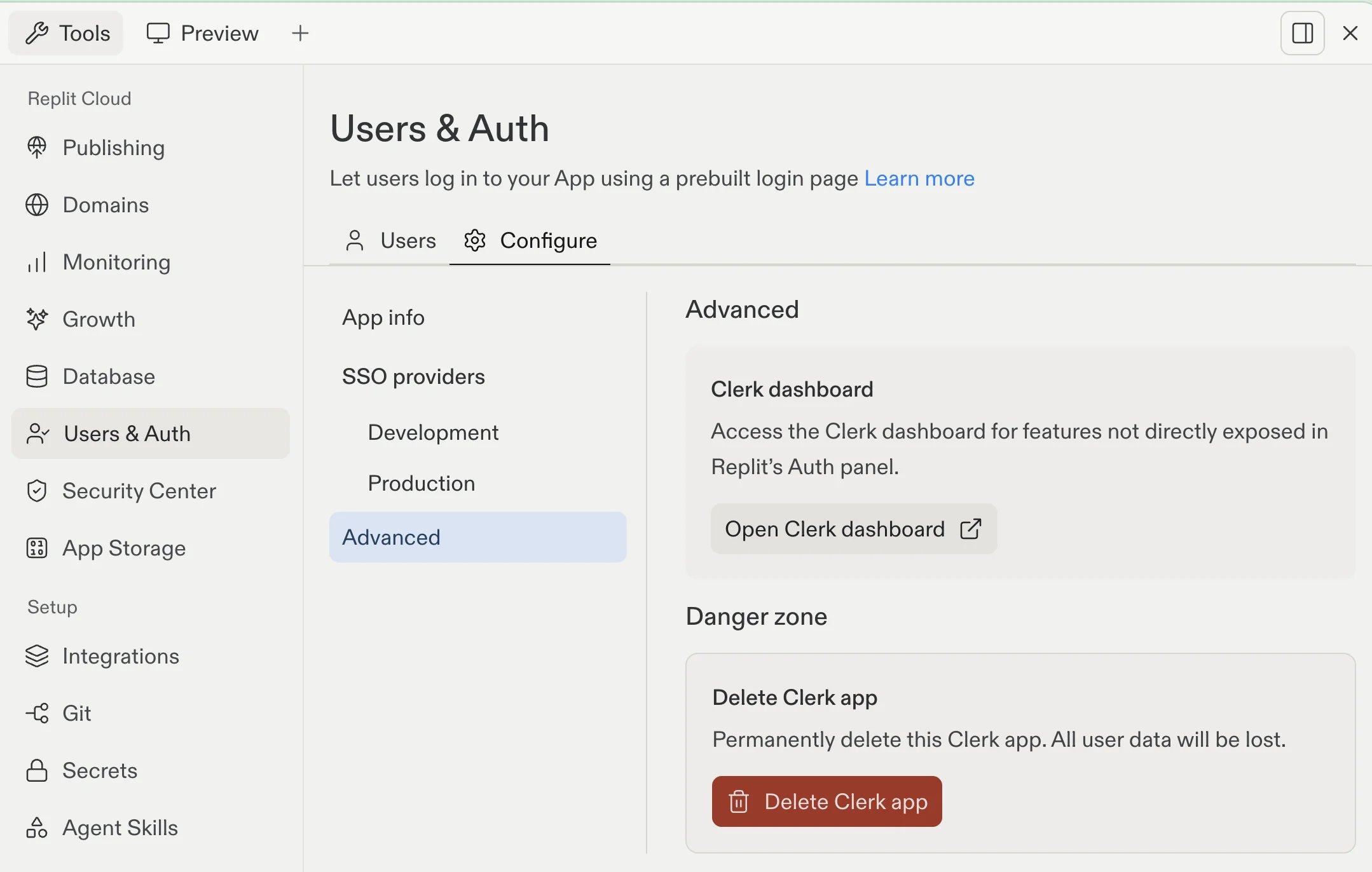 The Users & Auth tool with the Configure tab open, showing the Advanced section and the Open Clerk dashboard button.