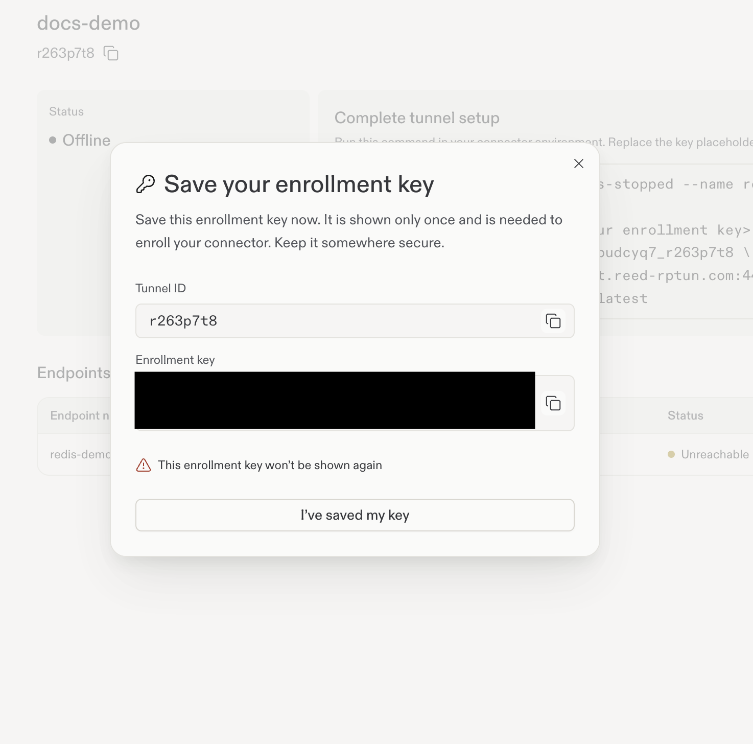 The one-time enrollment-key dialog. The key is intentionally hidden in this screenshot.