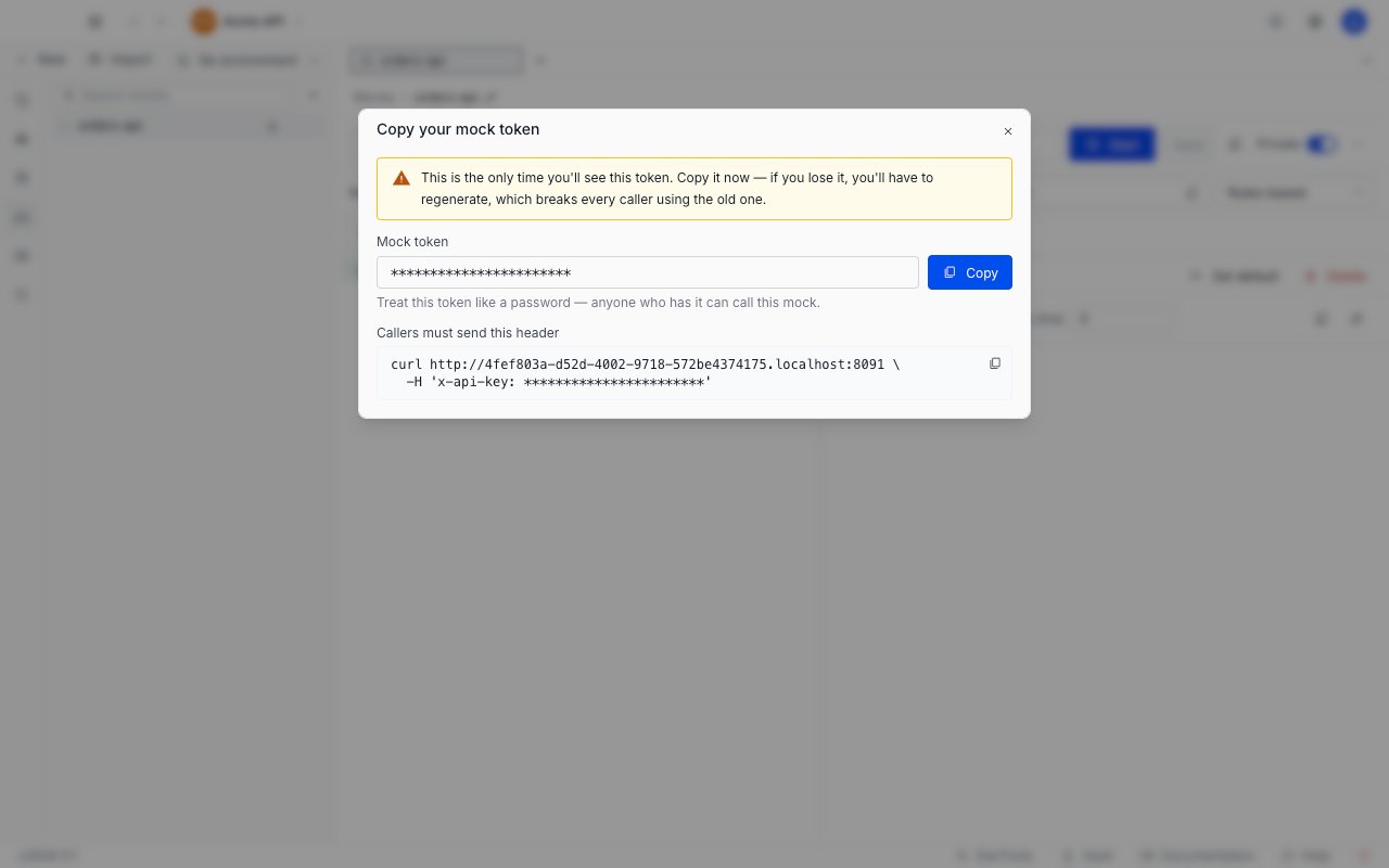 The Copy your mock token dialog showing the generated token, a copy button, and the curl command callers must send