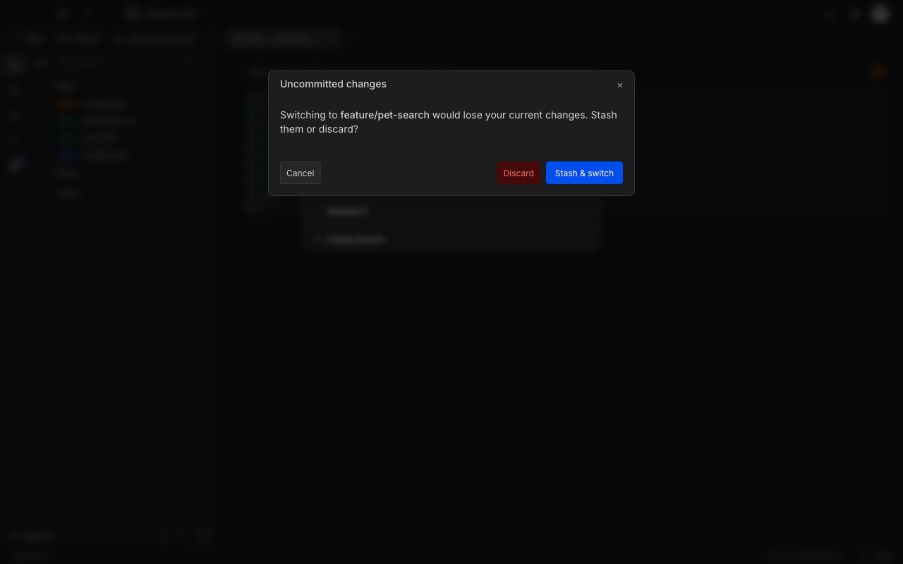 The Uncommitted changes dialog asking whether to stash or discard before switching to feature slash pet-search, with Cancel, Discard, and Stash and switch buttons