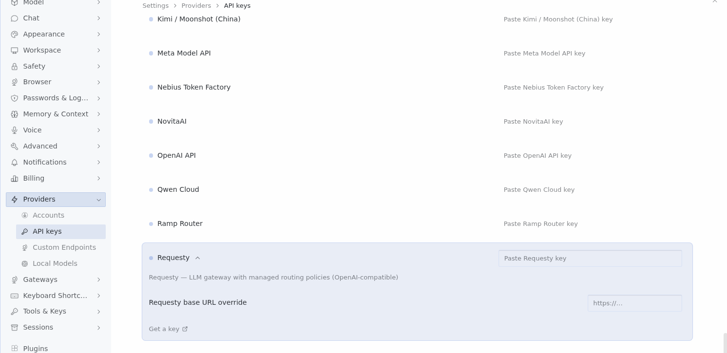 Hermes Desktop Settings, Providers, API keys with the Requesty row expanded: key field, base URL override and Get a key link