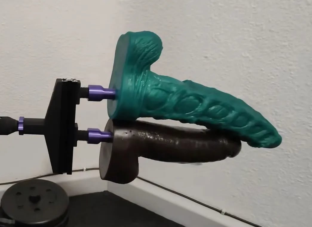 24mm Double Penetration Attachment mounted with toys