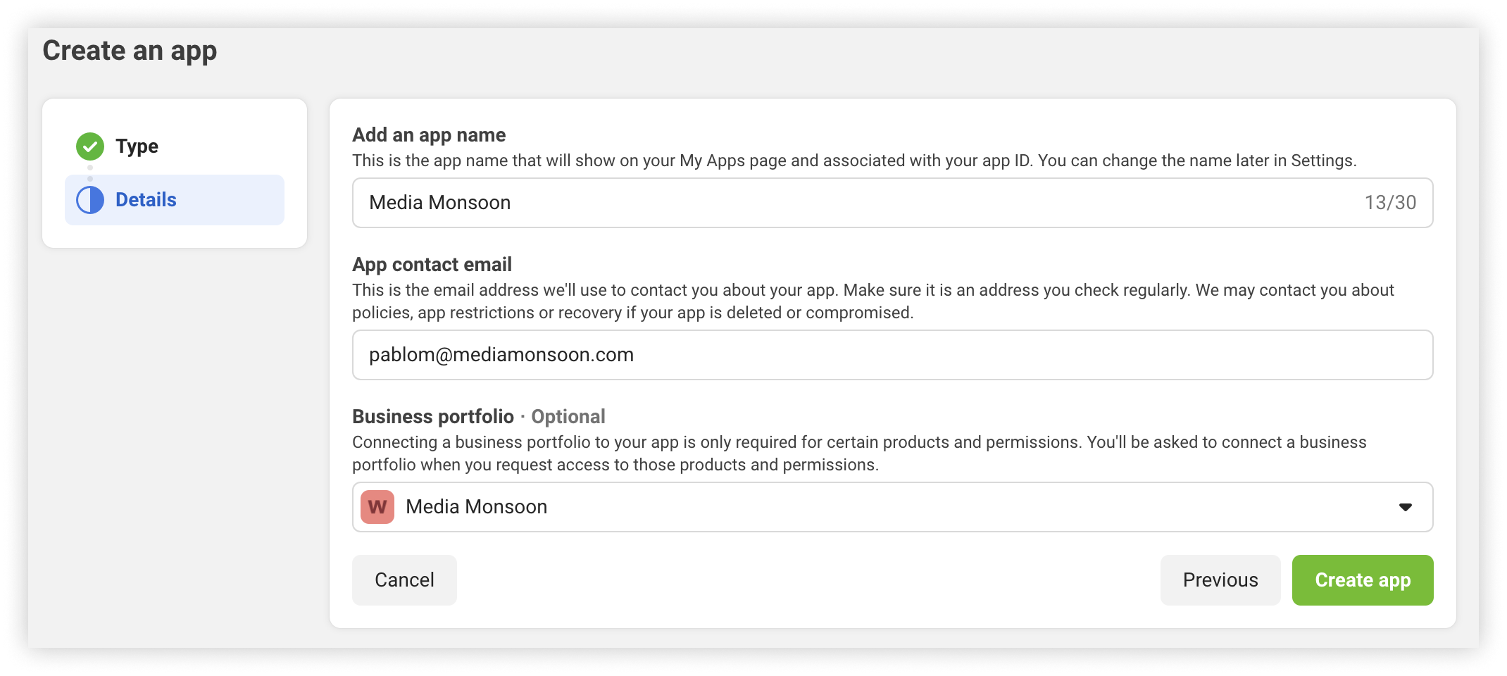 The Create an app details step, with the app name, contact email and business portfolio fields