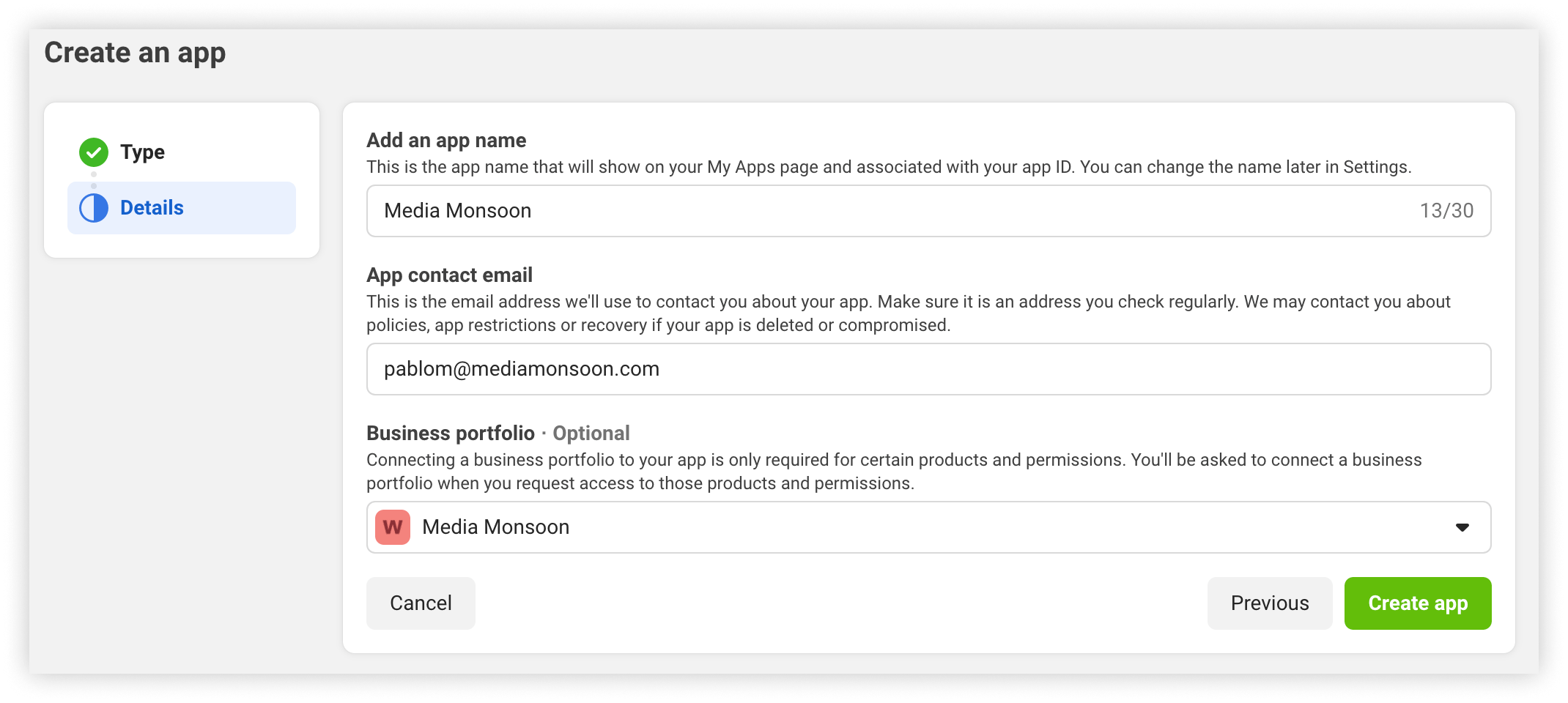 The Create an app details step, with the app name, contact email and business portfolio fields